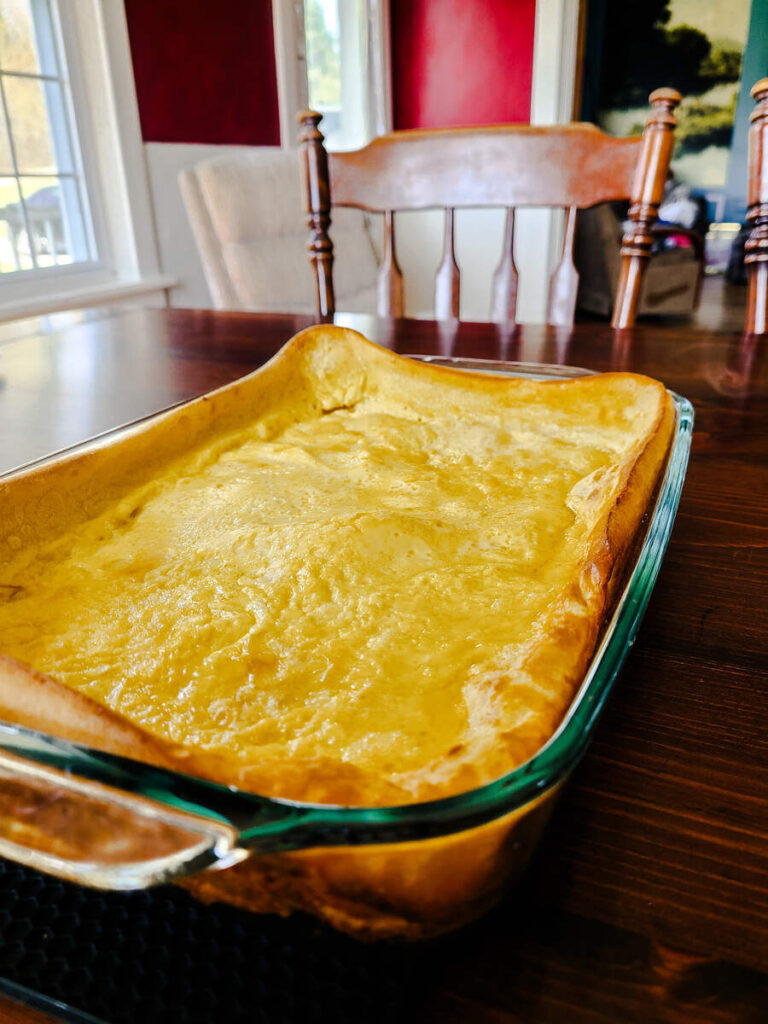 fluffy cooked German pancake on table cooling 