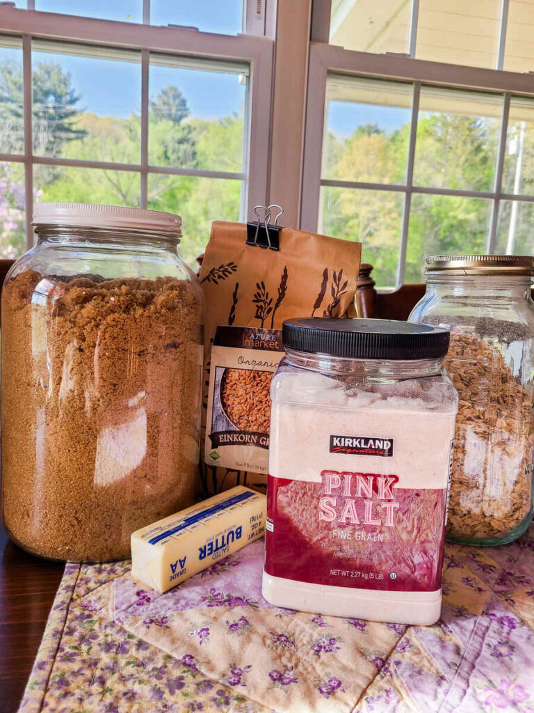 ingredients for crumble topping mixture, brown sugar, einkorn flour, salt, butter and oats. 