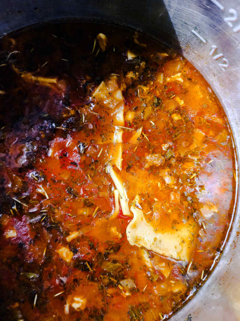 instant pot with cooked lasagna soup in it 